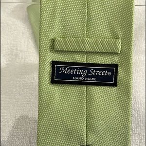 New condition mens Meeting Street patterned tie. Green with a faint pink accent.